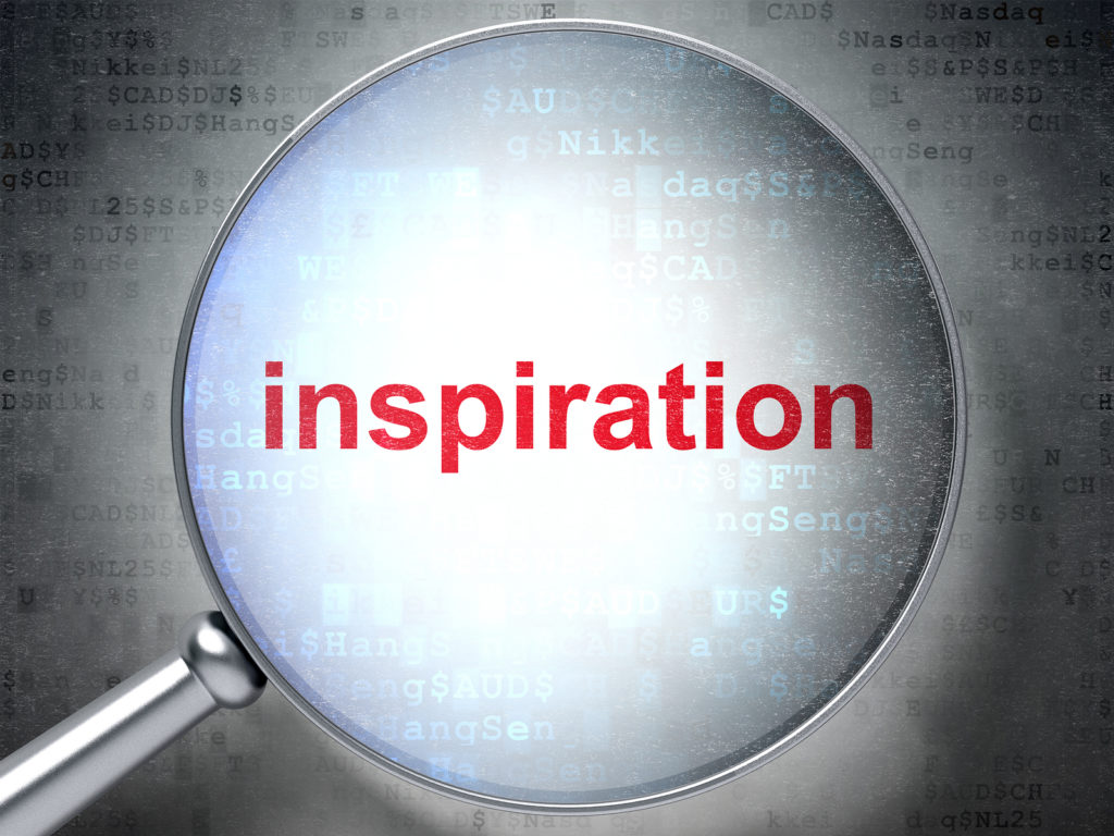 Magnifying glass with the word inspiration